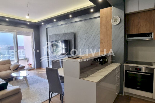 Apartment with two bedrooms in a new building in Budva